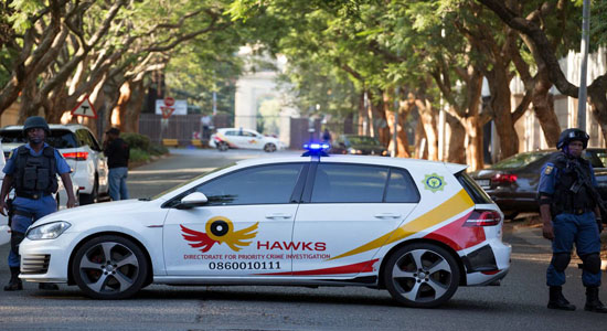 South Africa police raid Zuma allies' home