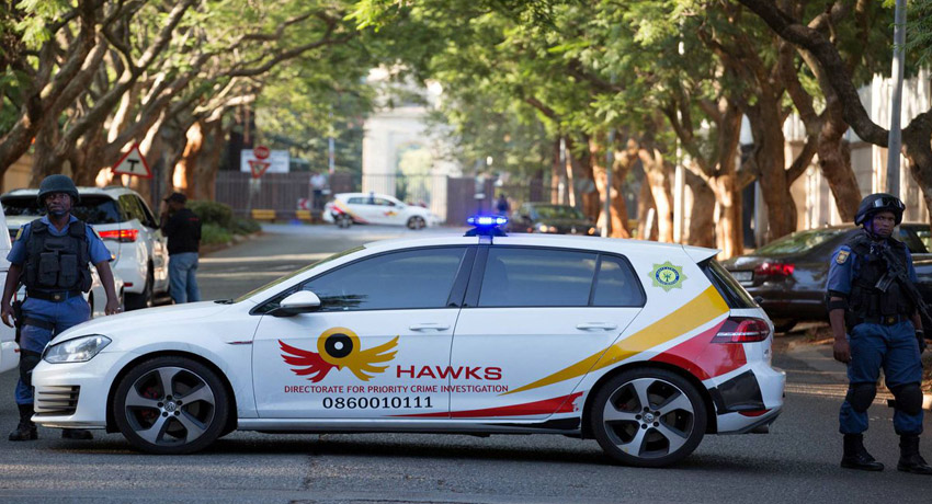 South Africa police raid Zuma allies' home