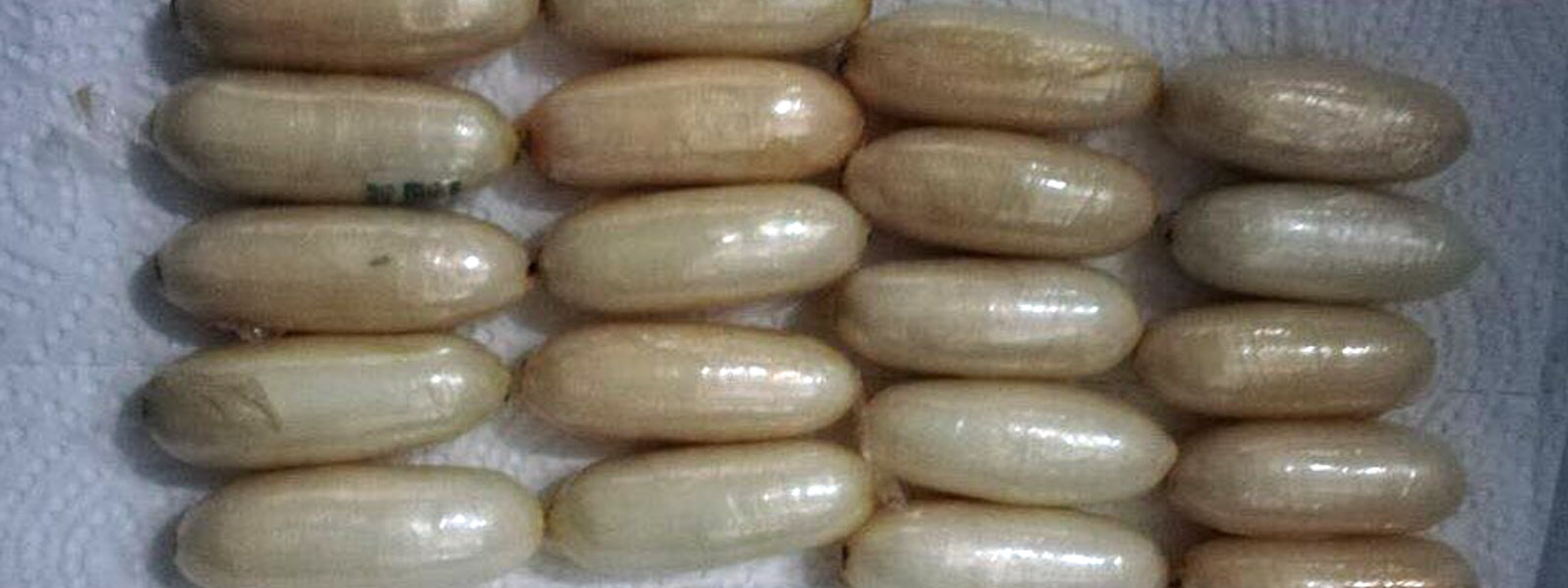 52 cocaine capsules retrieved from women