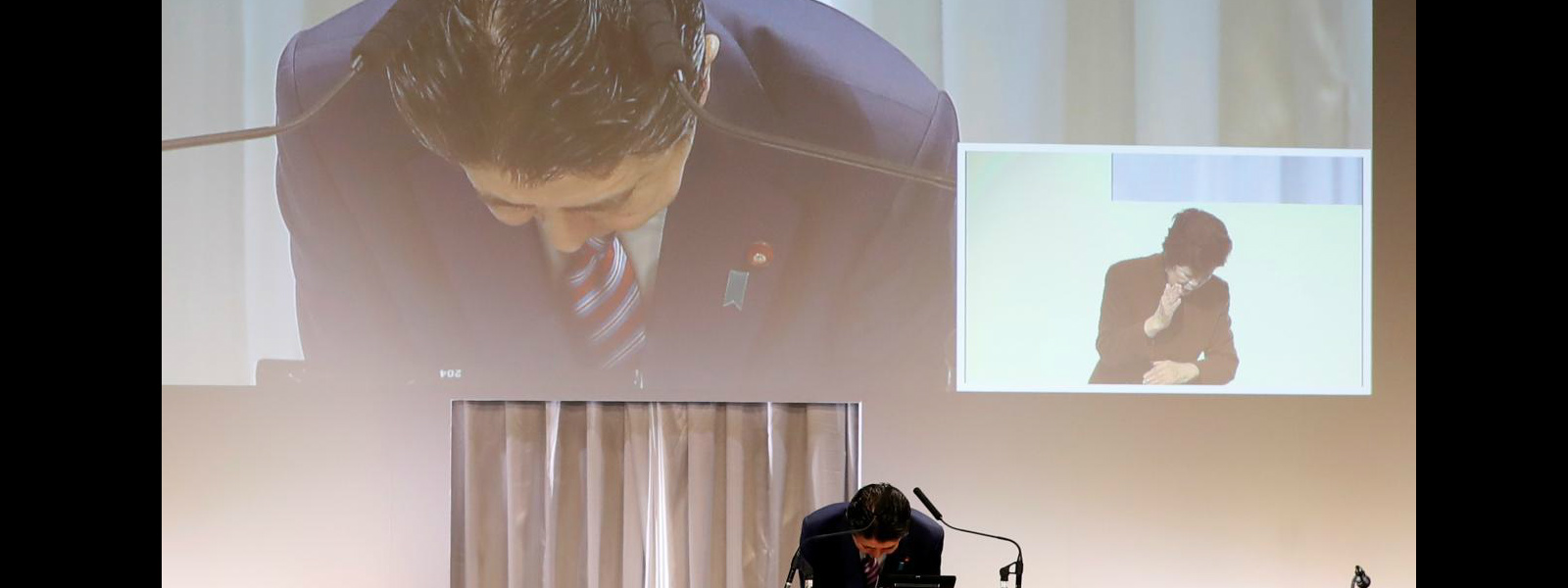 Japanese Prime Minister apologizes over scandal