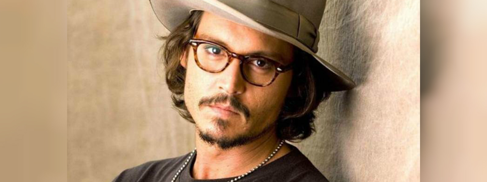 Johnny Depp and ex-managers settle lawsuit