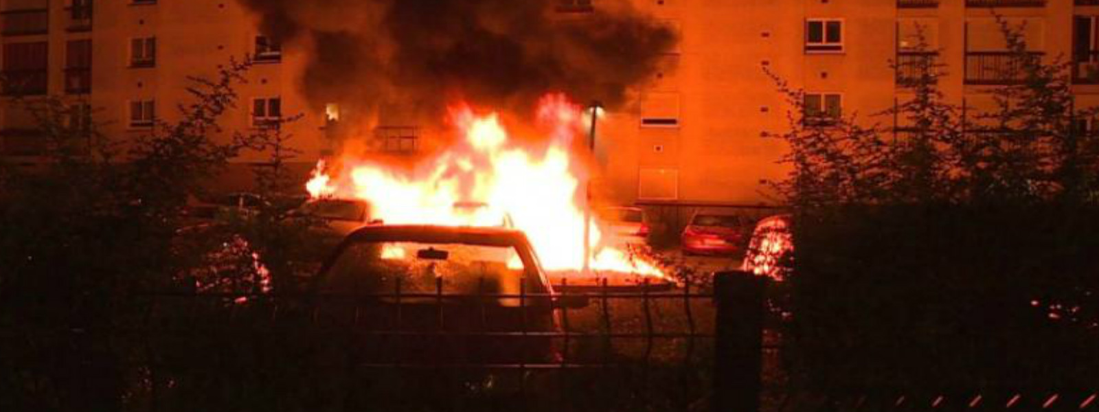Cars burn in Nantes during third night of riots