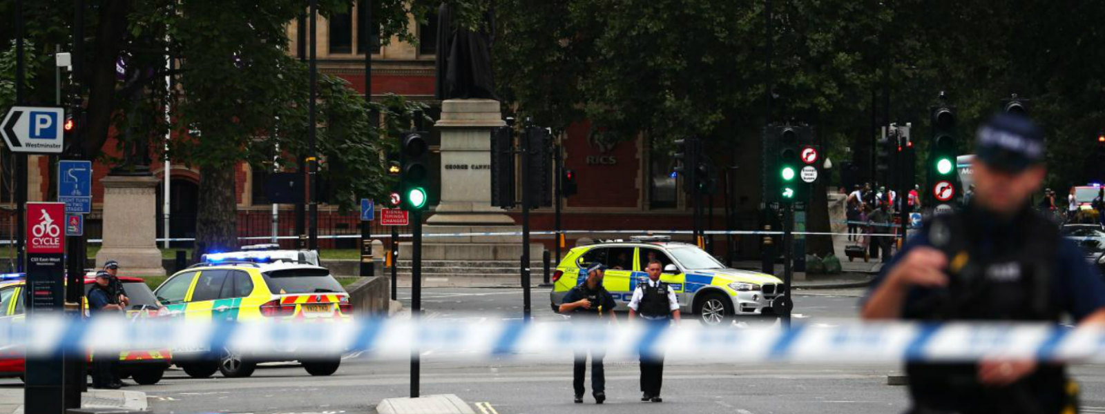 Man held as car crashes outside UK parliament