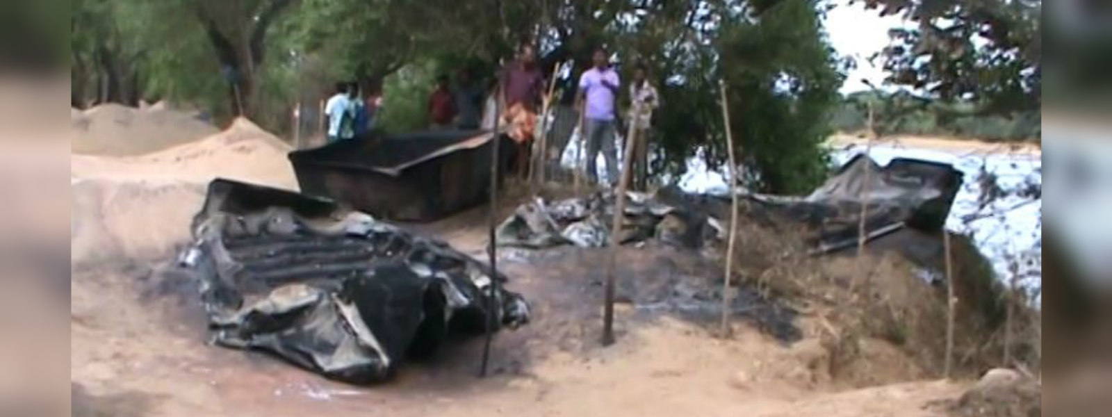 Fire destroys 25 boats used for sand mining