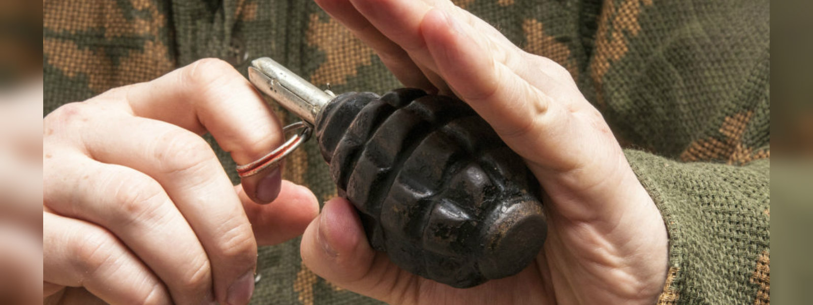 Two arrested for possession of a hand grenade
