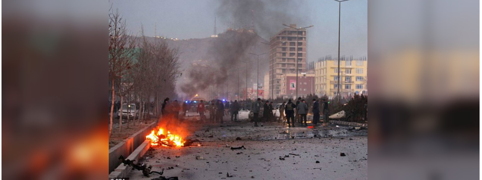 At least 20 dead as twin blasts hit Afghan capital