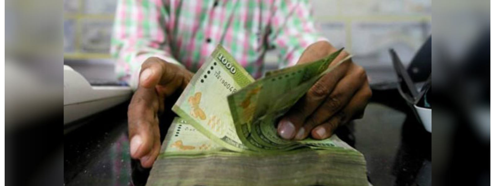 Sri Lankan rupee hits record low 