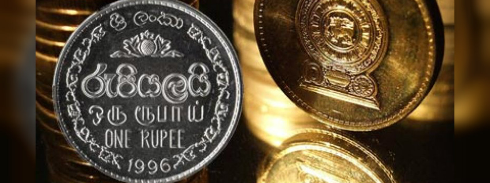 SL rupee touches fresh low of 164.80 per dollar 