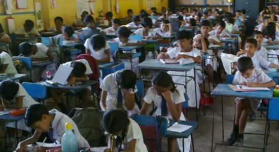 2 students tied for top scores of scolarship exam