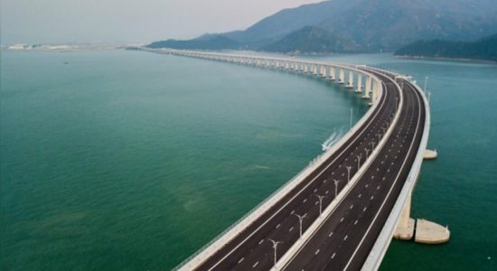 China opens longest sea- crossing bridge 