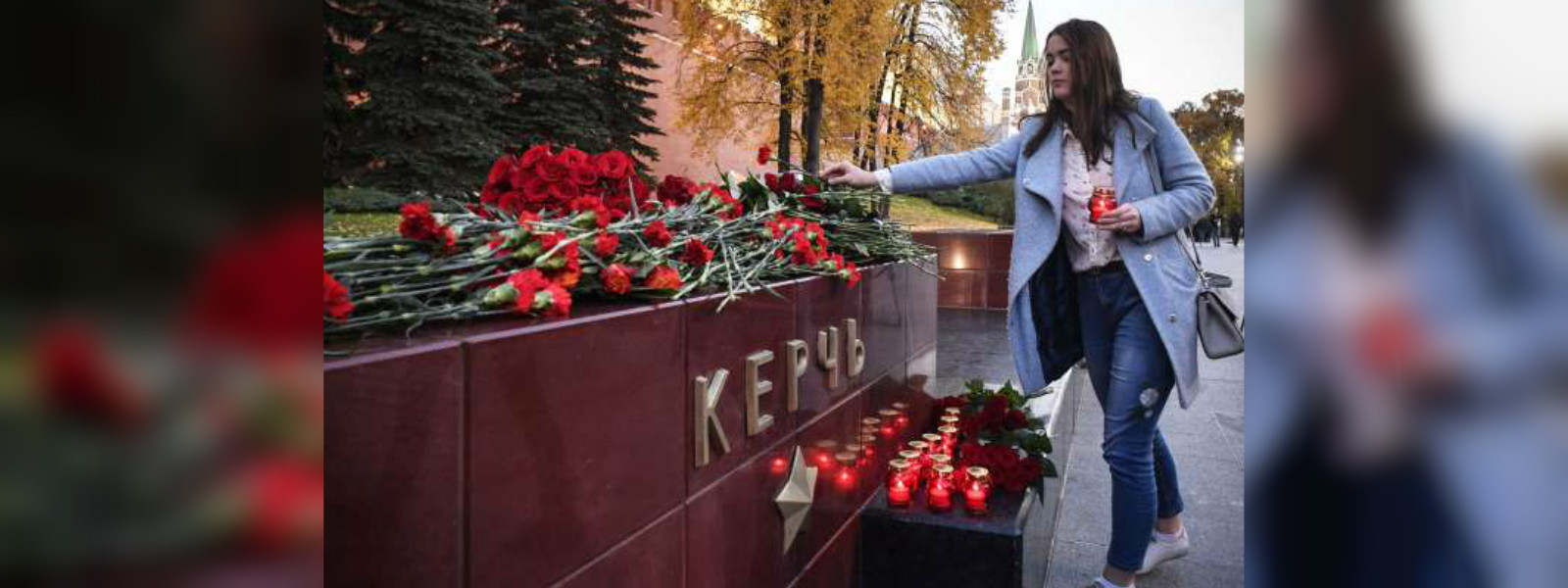 Flowers, candles for victims of Crimea attack