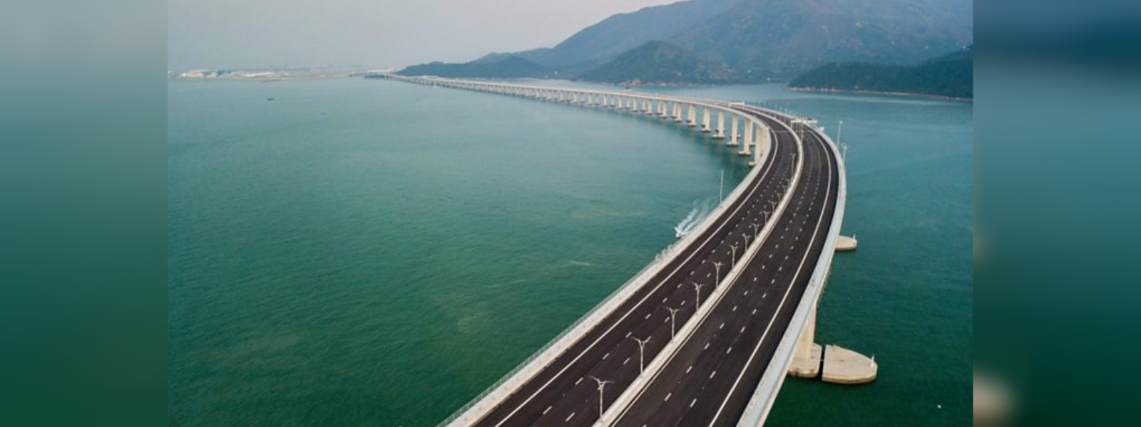 China opens longest sea- crossing bridge 