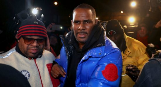 R. Kelly turns himself in for sex assault charges 