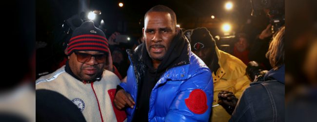 R. Kelly turns himself in for sex assault charges 