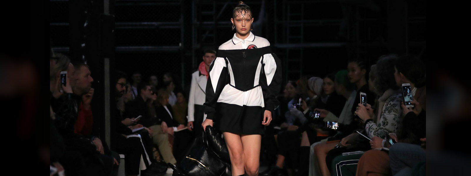 Gigi Hadid walks for Burberry at Brit Fashion Week