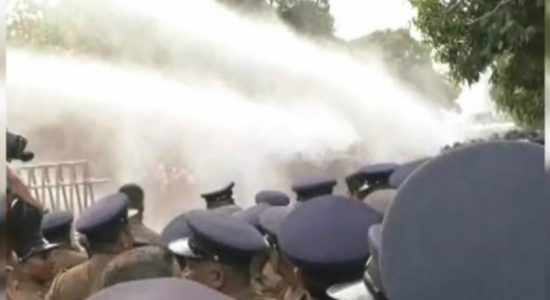 Police fire water cannons at University Students