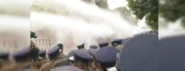 Police fire water cannons at University Students