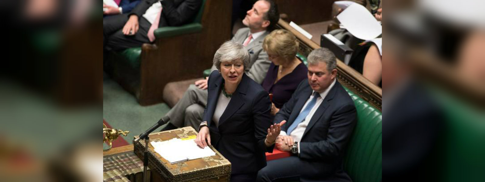 Britain parliament votes to delay Brexit deal 