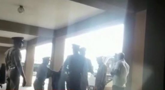 Arrested staffer brought to parliament