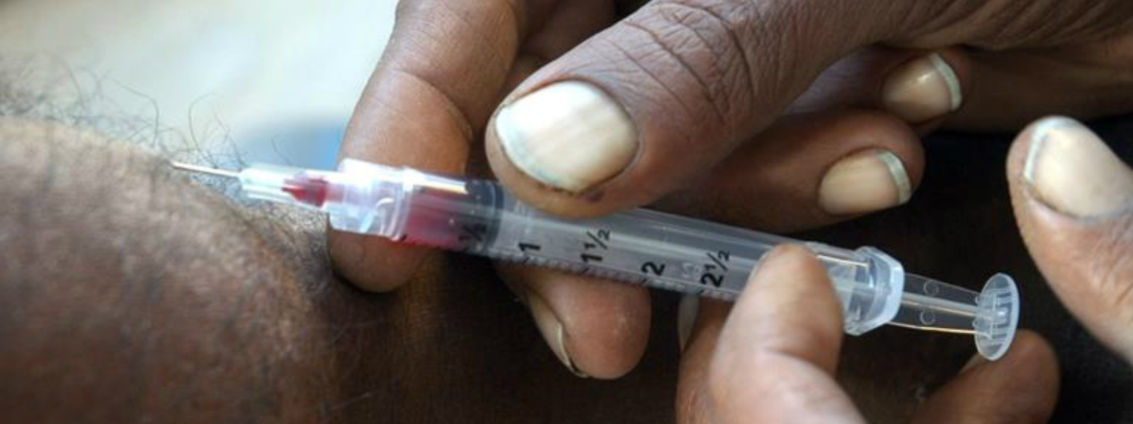 Doctor arrested: 90 infected by HIV syringe