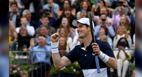 Andy Murray marks a successful return with doubles win