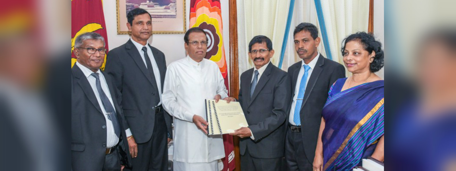 PCoI hands over its interim report to President