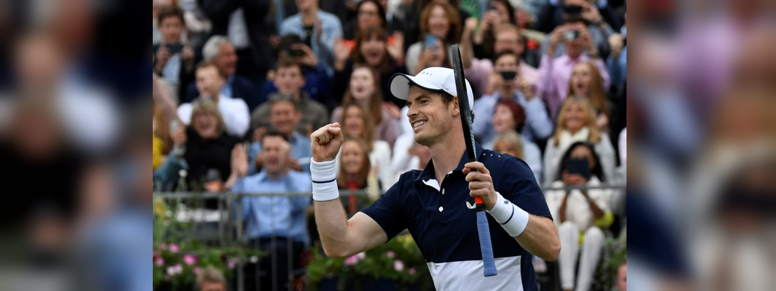 Andy Murray marks a successful return with doubles win