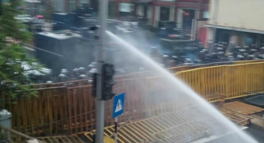 Police fire tear gas and water cannons to disperse protesting university students
