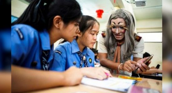 Thai teacher put on make-up to boost students