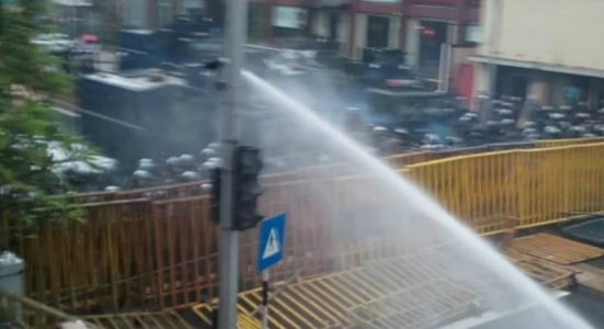 Police fire tear gas and water cannons