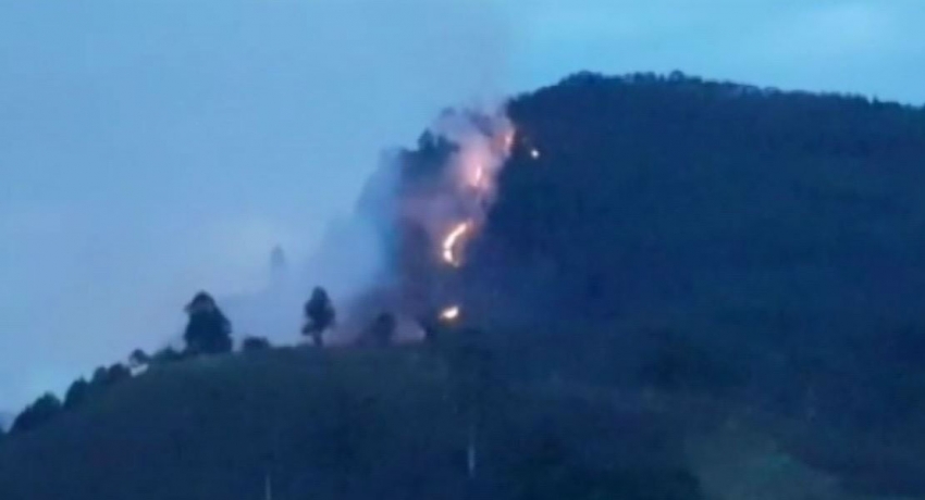 Firefighters continue to battle forest fire in Ella