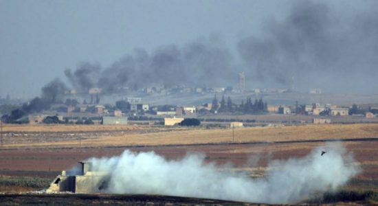 Bombardment in border town as Turkey pushes