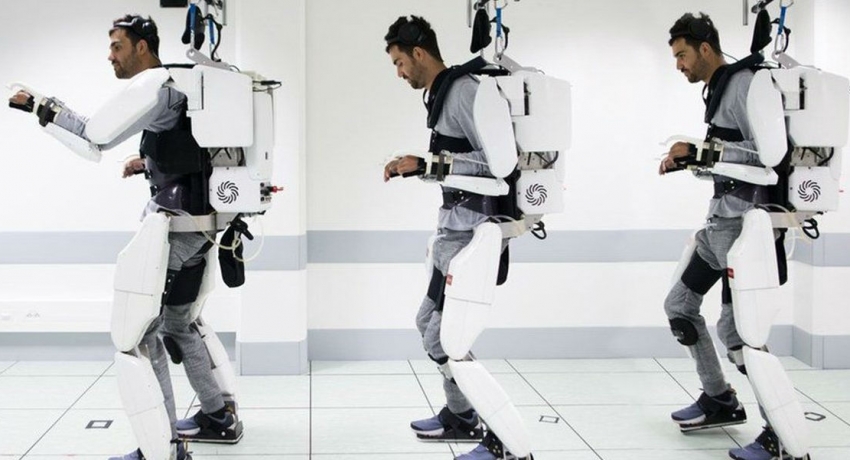 Paralysed man harnesses brain power to walk again with robot exoskeleton