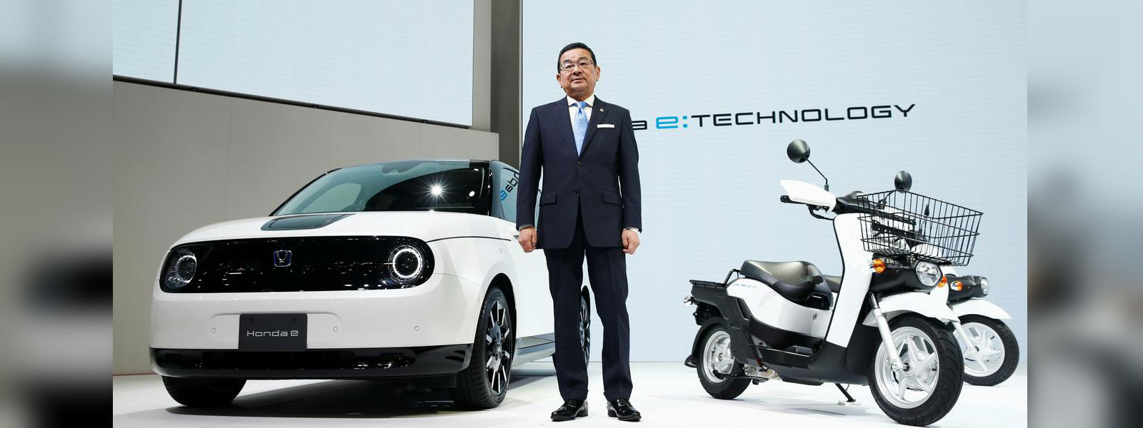 To go big on EVs, Japanese car makers think small