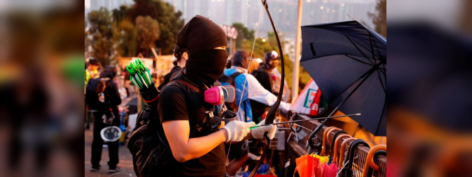 Hong Kong protests: Fire arrows and petrol bombs