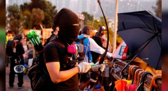 Hong Kong protests: Fire arrows and petrol bombs