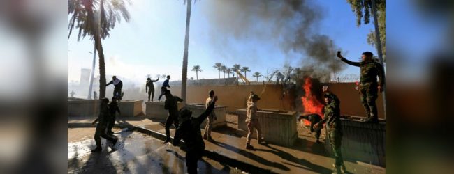 Protesters set fire to US embassy in Baghdad