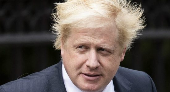 Boris Johnson gets rapturous welcome at No. 10