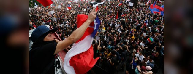 Thousands of Chilean protesters welcome 2020