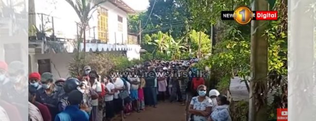 MASSES GATHER TO OBTAIN ANTI-COVID-19 TONIC 