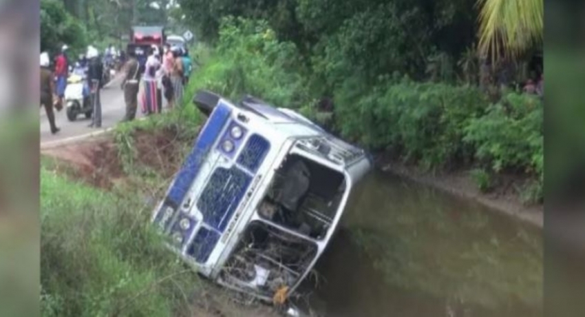 30 INJURED AFTER BUS CRASH INTO CANAL