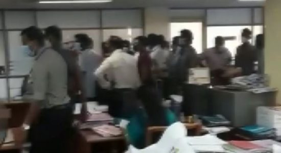 Protest at Exams Dept. against delayed OT payment