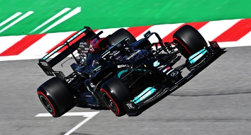Hamilton secures victory in Spain after race-long battle with Verstappen