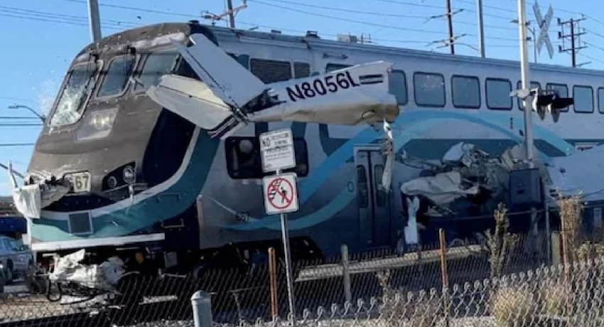 Plane hit by train after crash landing on railway tracks in California