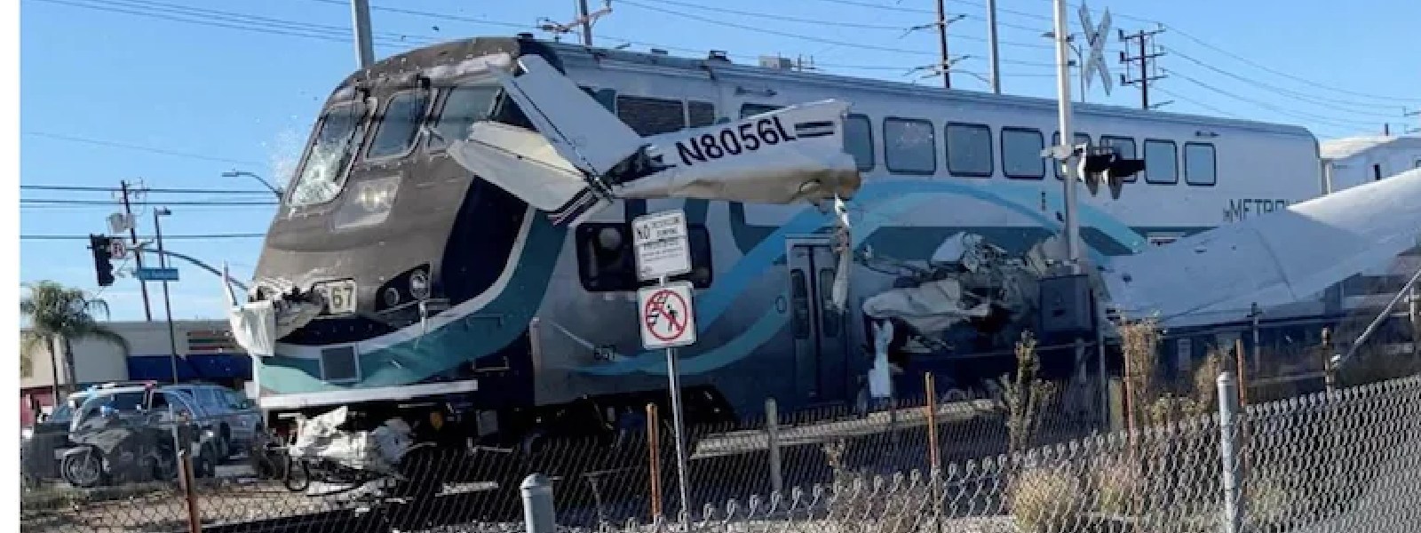 Plane hit by train after crash landing on railway tracks in California
