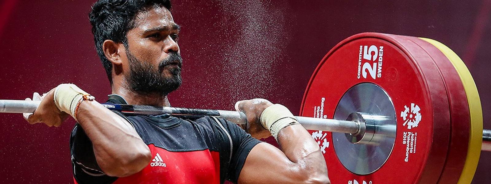 Sri Lanka clinches another gold at Singapore weightlifting championships