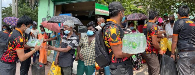 Gammadda Volunteers step up to help people in queues