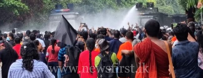 Students protesting near Parliament tear gassed