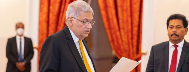 Ranil votes with government to defeat motion in Parliament