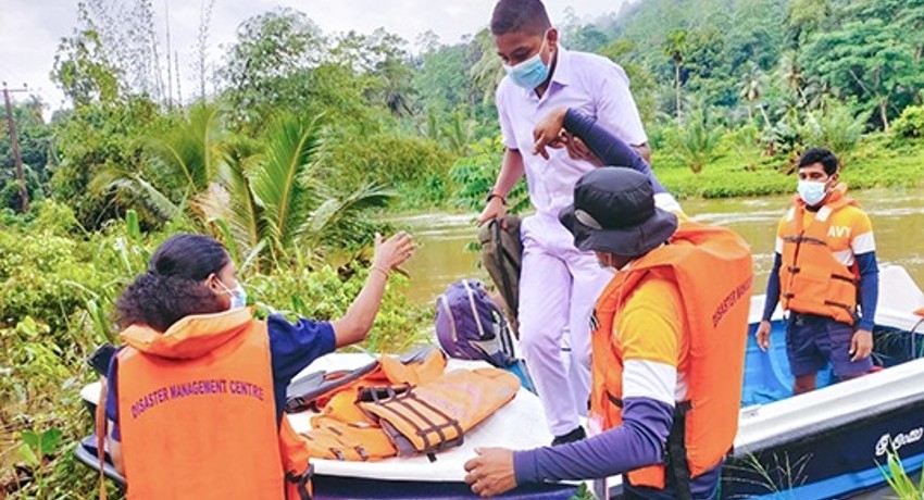 Navy relief teams assist flood affected students